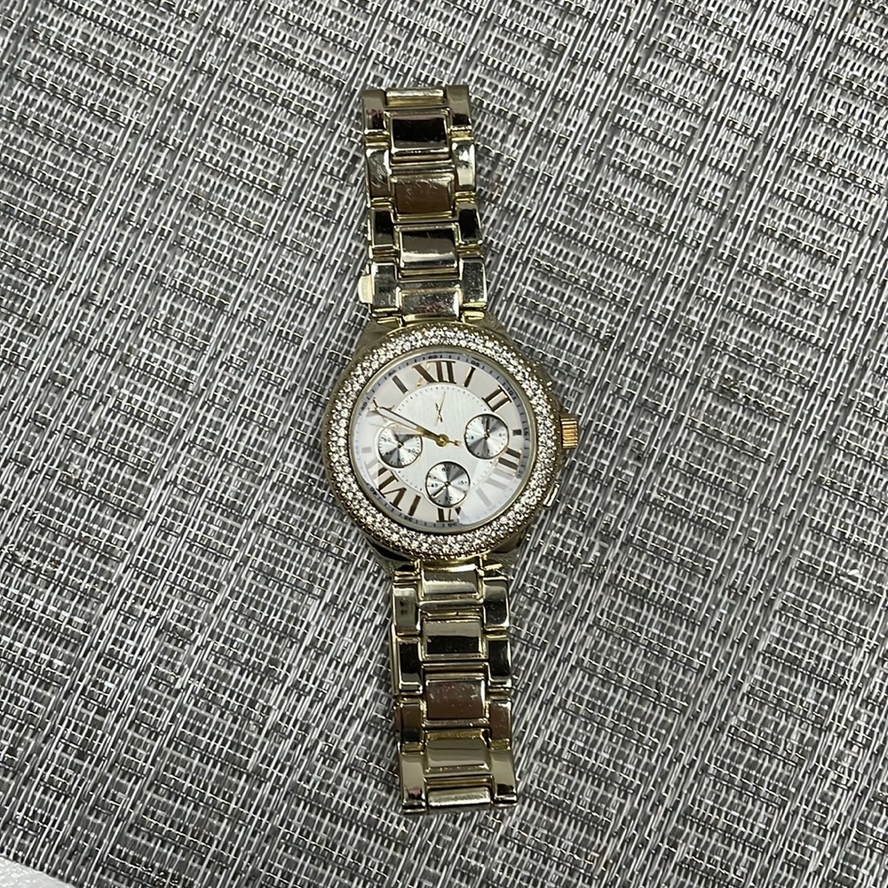 Brand new, never worn Premiere jewelry boyfriend watch.